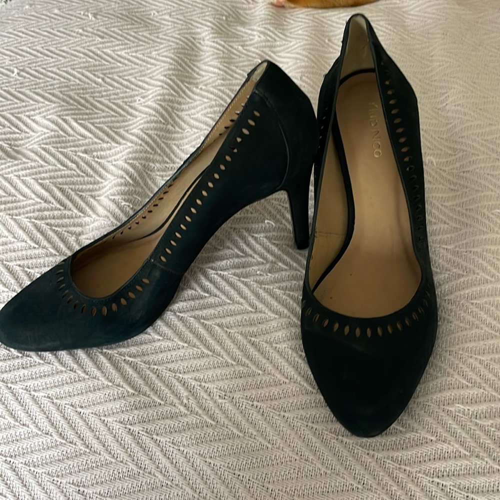 Like new - Genuine black leather.  Worn once.